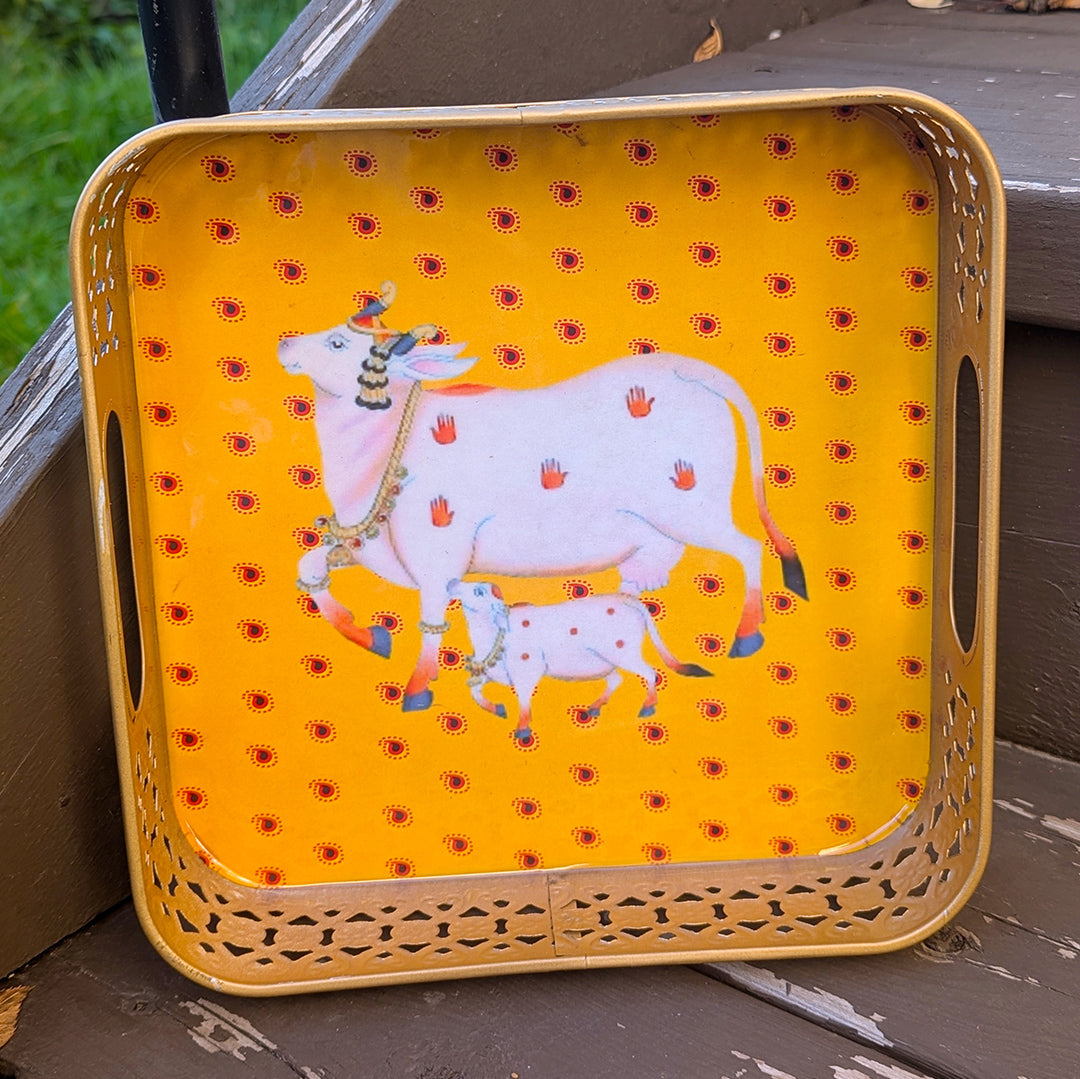 Square Golden Tray with Yellow Pichwai Cow Art – 8 Inch Decorative Tray for Festive & Home Décor