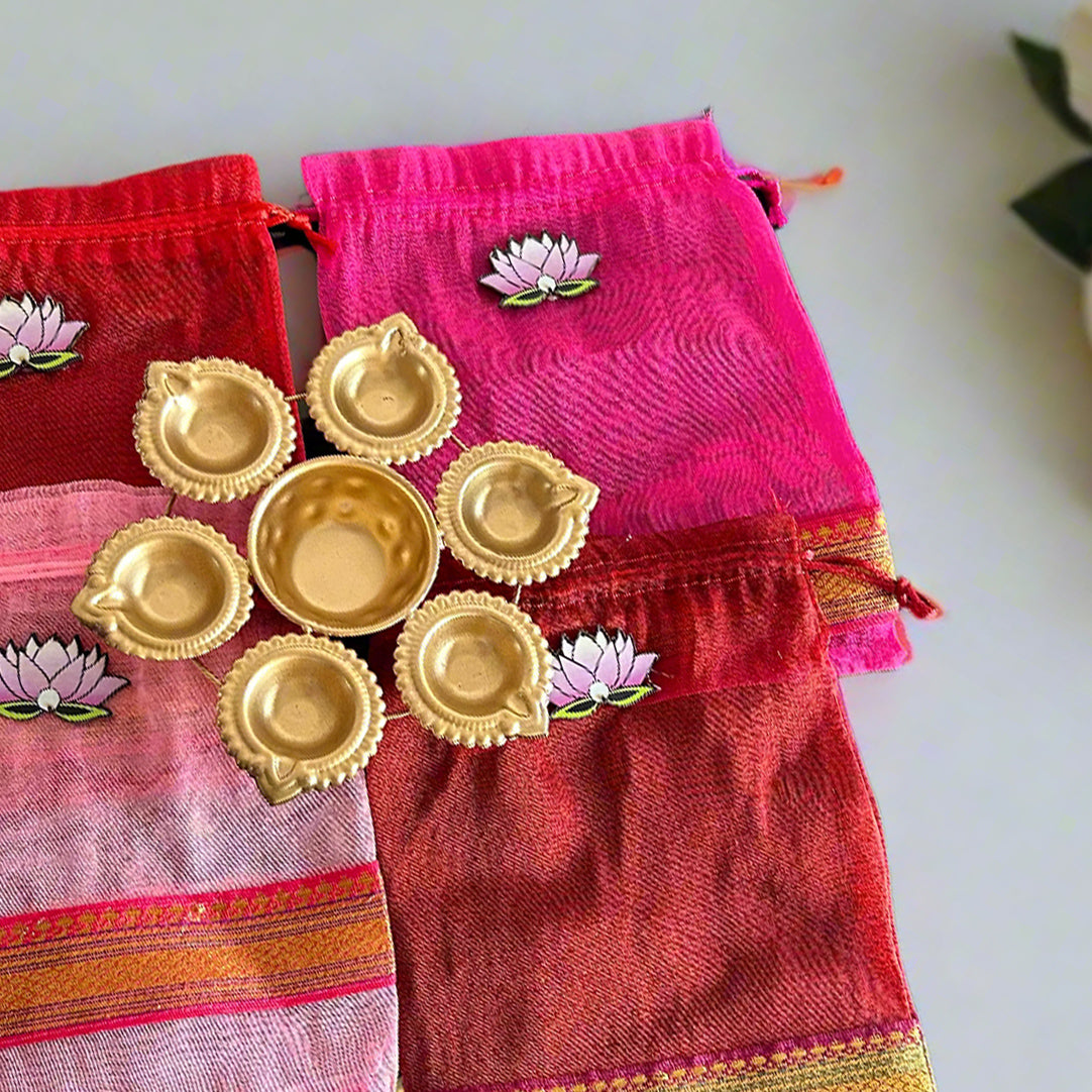 Lotus Cut Brocade Border Potli Bag with Diya Urli