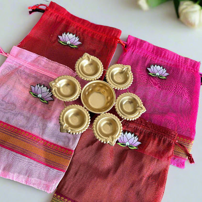 Lotus Cut Brocade Border Potli Bag with Diya Urli