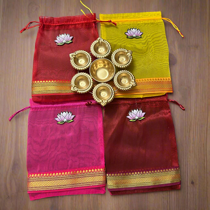 Lotus Cut Brocade Border Potli Bag with Diya Urli