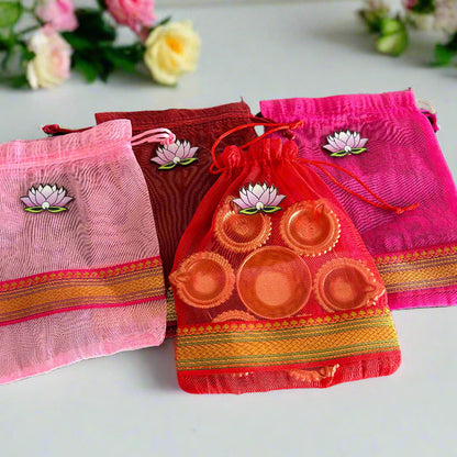 Lotus Cut Brocade Border Potli Bag with Diya Urli