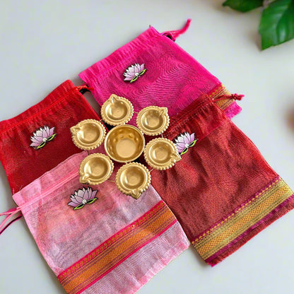 Lotus Cut Brocade Border Potli Bag with Diya Urli
