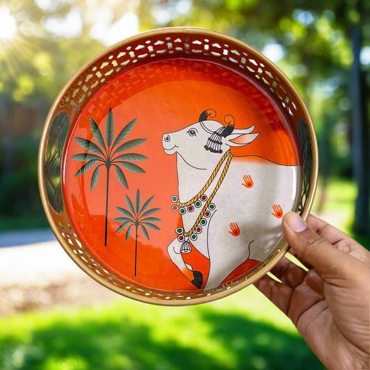 Circular Golden Tray with Orange Pichwai Cow Art – 8 Inch Decorative Tray for Festive & Home Décor