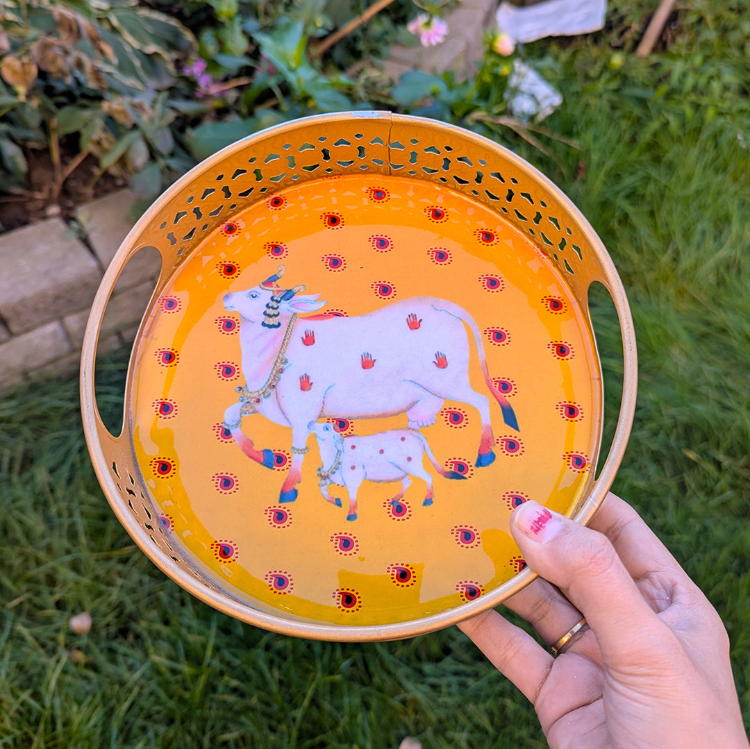 Circular Golden Tray with Yellow Cow Art – 8 Inch Decorative Tray for Festive & Home Décor