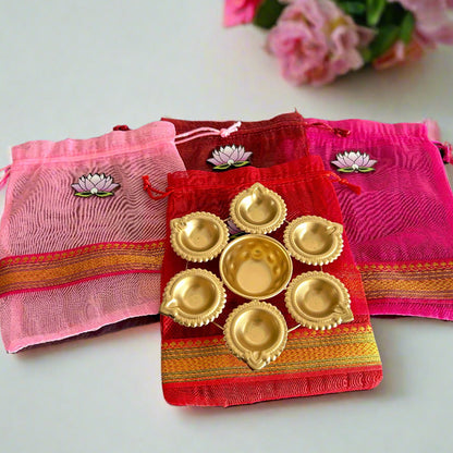 Lotus Cut Brocade Border Potli Bag with Diya Urli