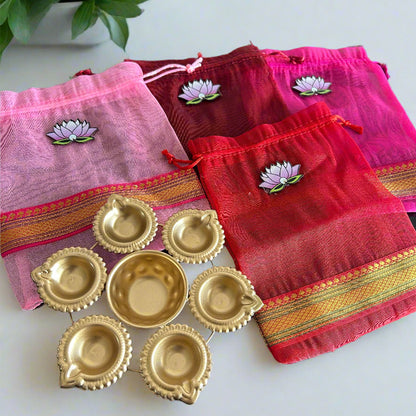 Lotus Cut Brocade Border Potli Bag with Diya Urli